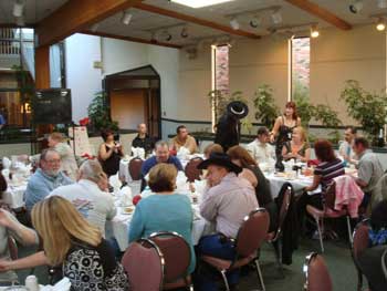 Senate members (center table) wait for the awards dinner to start.
